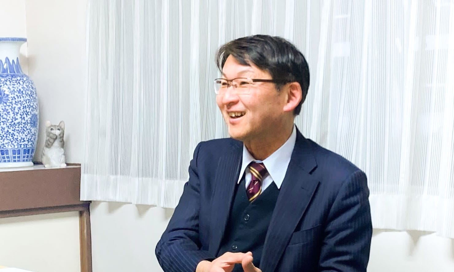 梅澤俊秀先生が話している写真
